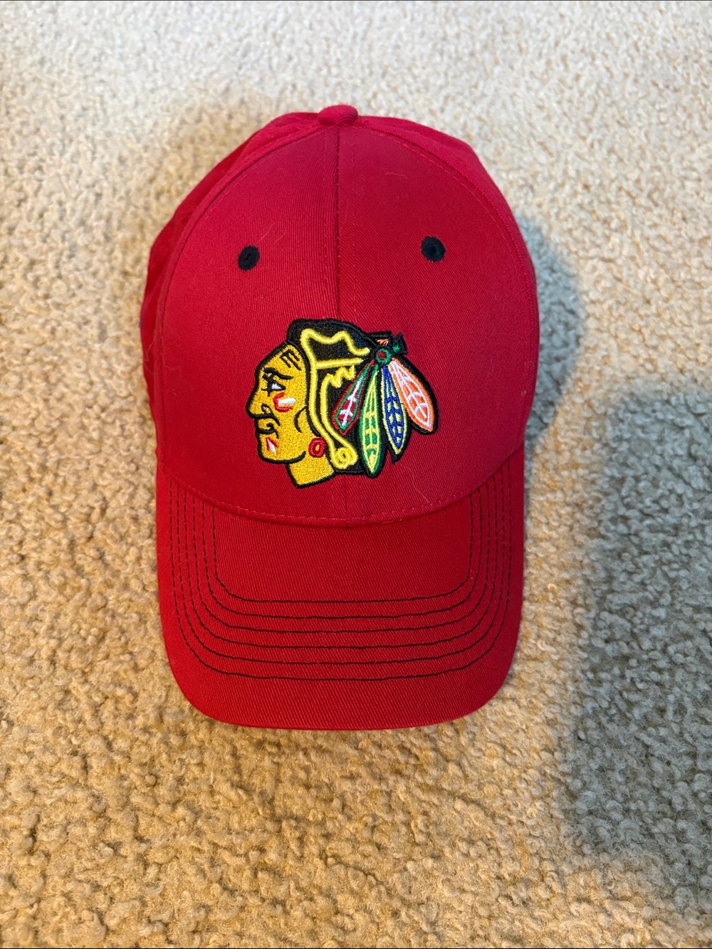 Red Baseball Cap with Embroidered Native Head Patch